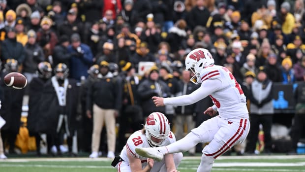 Wisconsin kicker Nate Van Zelst making a field goal against Iowa